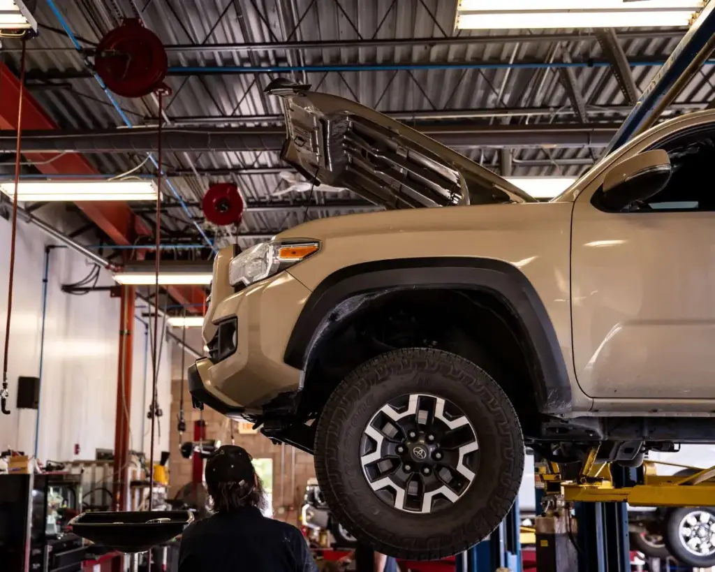 car suspended in a garage