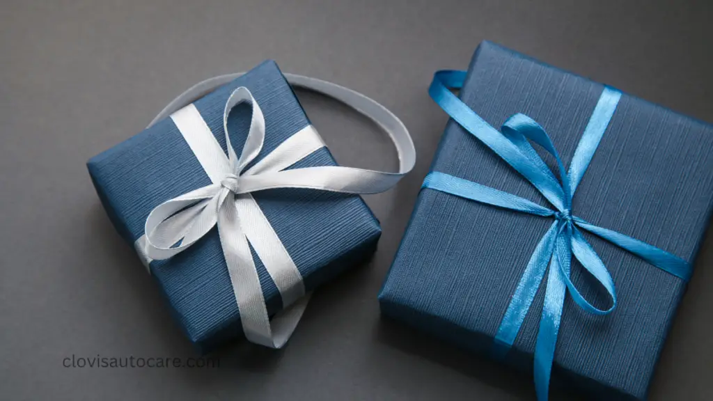 car accessories gift for men. two gifts rapped in in blue 