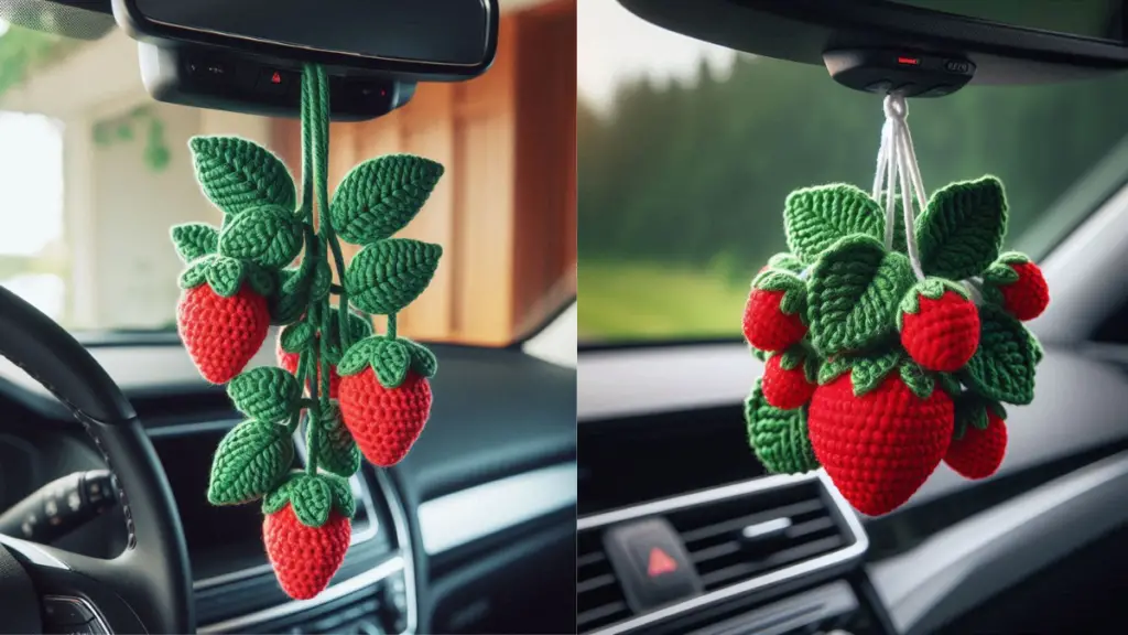 A realistic image of a crocheted decoration hanging from the rearview mirror of a car, consisting of green leaves and red strawberries, suggesting a handmade personal touch to the vehicle’s interior