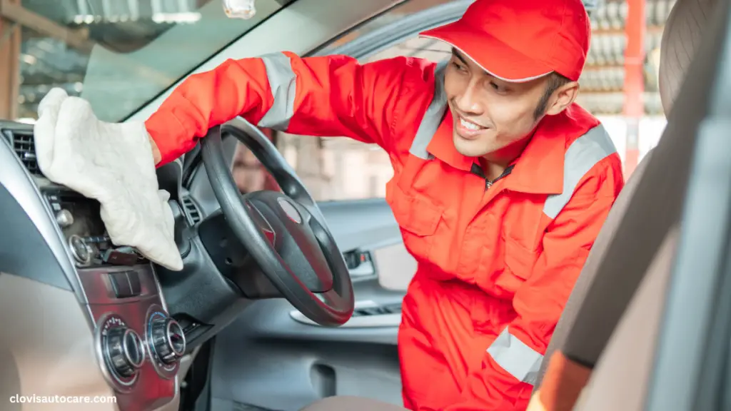 cleaning car dashboard after deep cleaning.